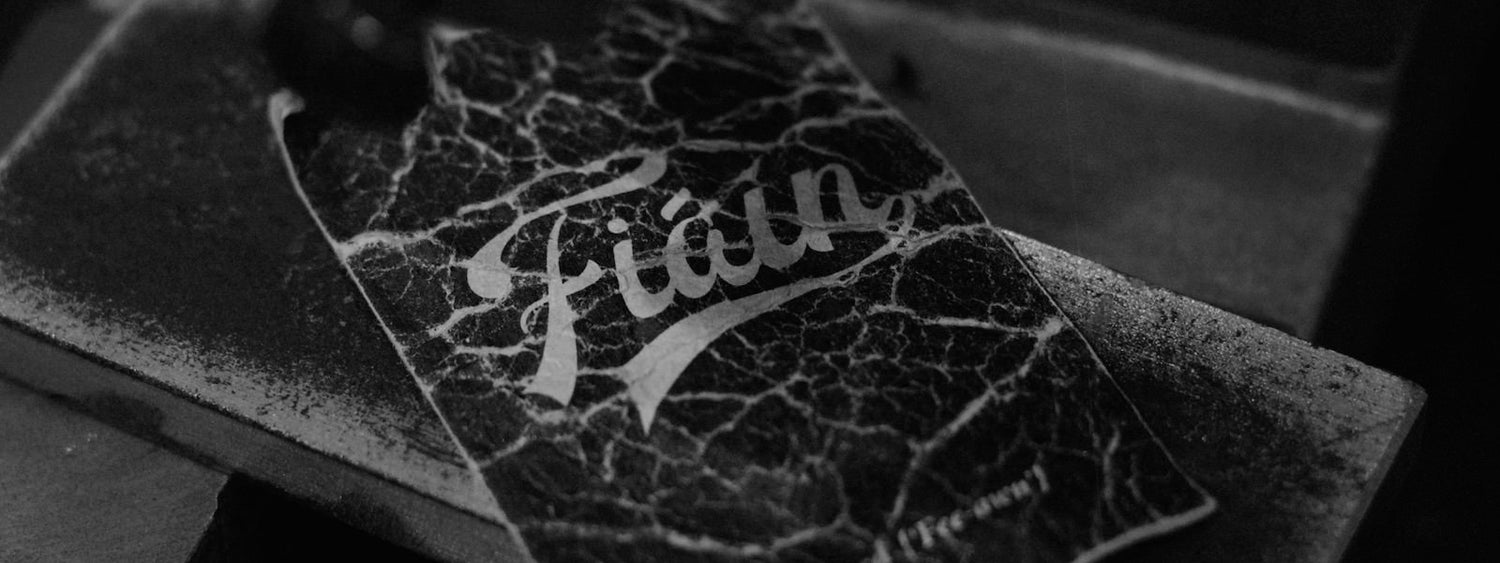 Up close shot of the beautiful texture on the Fiáin kraft business card.